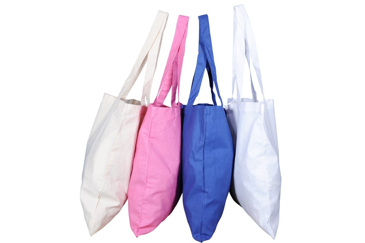 Cotton tote bags in white, pink and blue